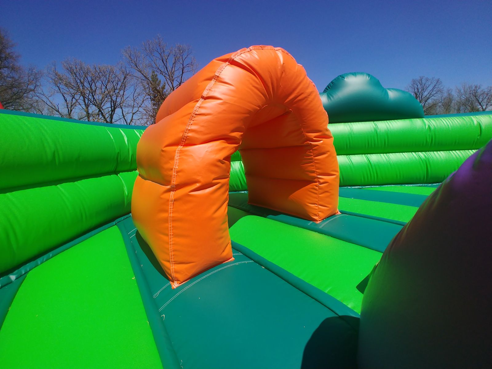 Tunnel for toddlers to crawl through inside bounce house rental